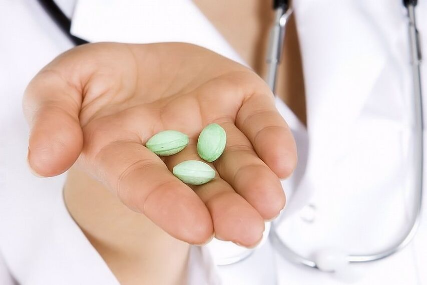 The doctor offers pills for lower back pain.
