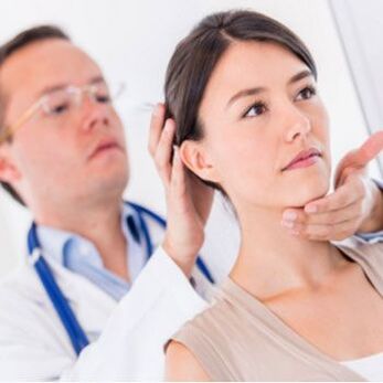 The neurologist examines a patient who has neck pain.
